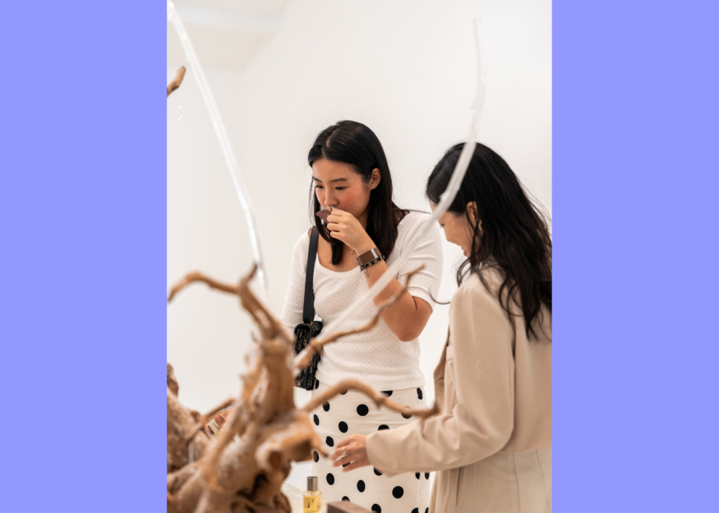 Two ladies smelling perfume | Can fragrance change your mood